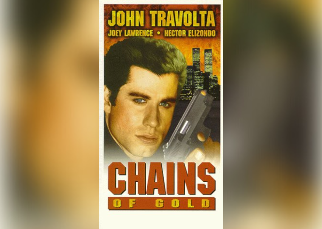 John Travolta holding a handgun on the cover of the movie poster.