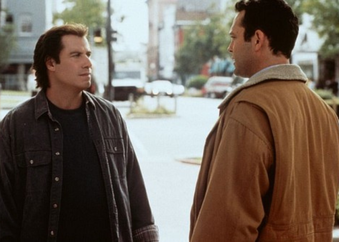 John Travolta talking with Vince Vaughn on the street.