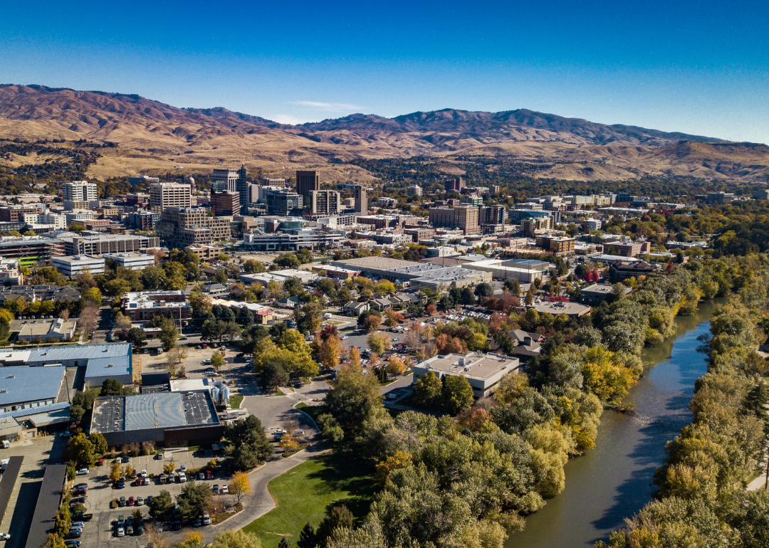 An aerial view of Boise with mountains in the background.