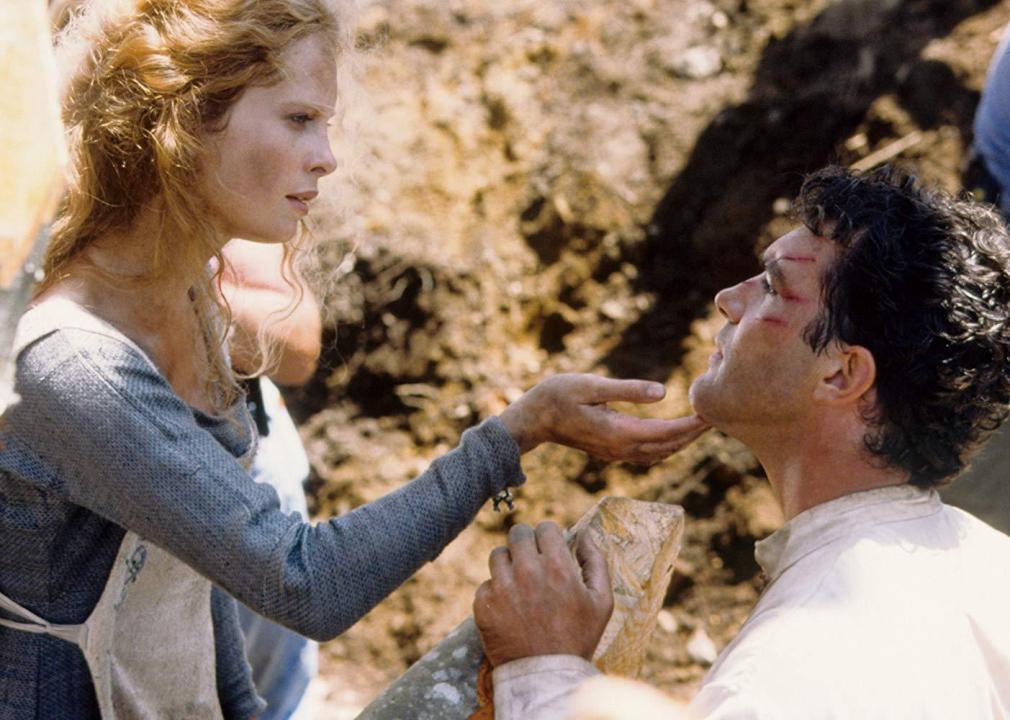 A woman tends to a wounded Antonio Banderas.