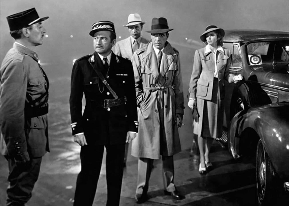 Humphrey Bogart, Paul Henreid, Claude Rains and Ingrid Bergman pose for a publicity still for the Warner Bros film ‘Casablanca'.