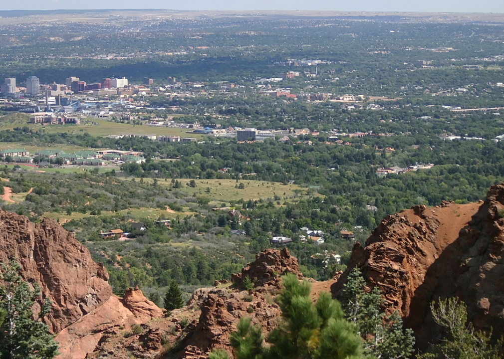 View of Colorado Springs homes and downtown from the mountains.