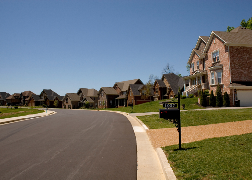 Street of large brick homes in Nashville, Tennessee.