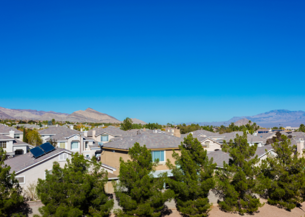 View over rooftops of homes in mountainous Las Vegas, NV.