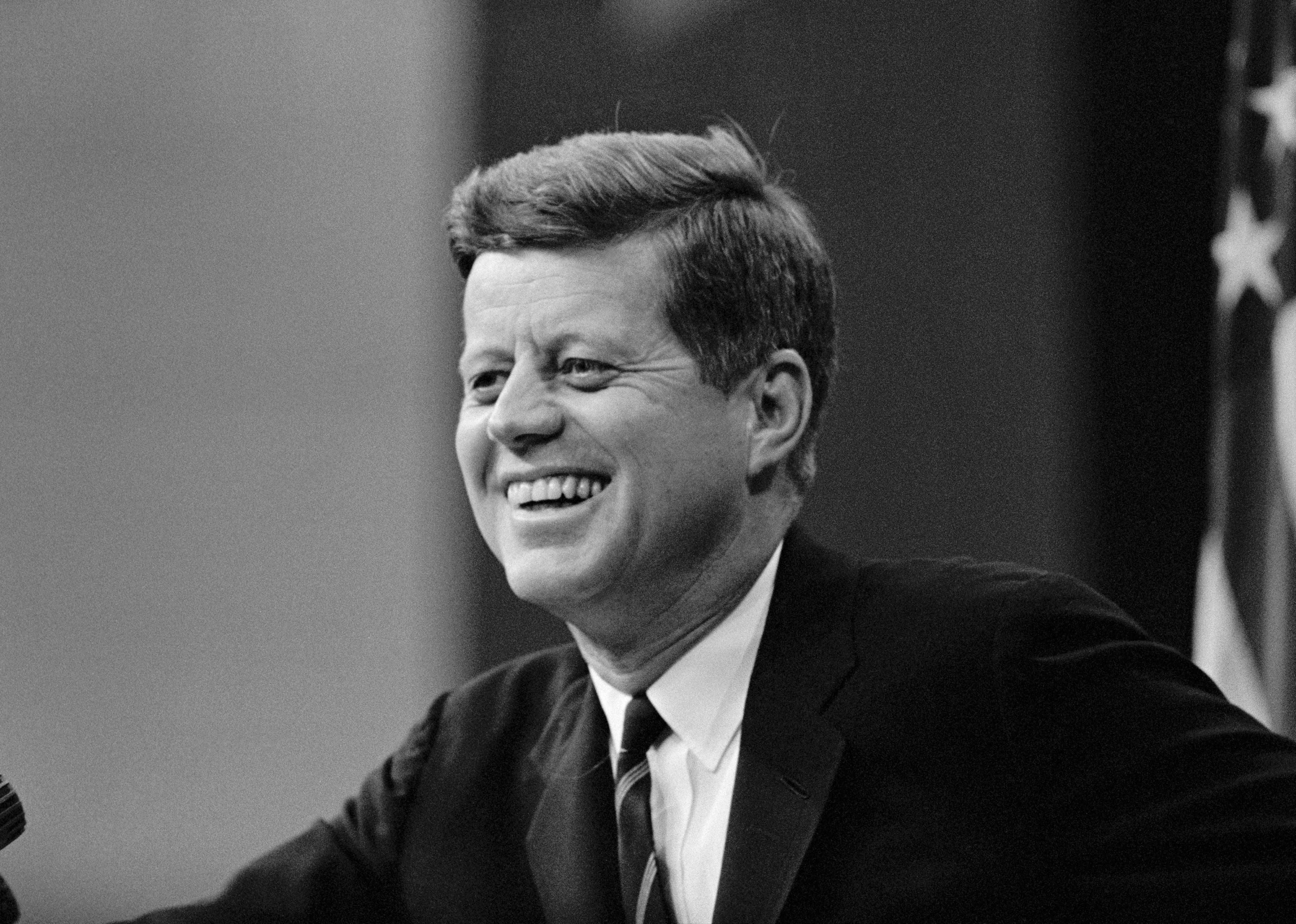 John F. Kennedy smiling.