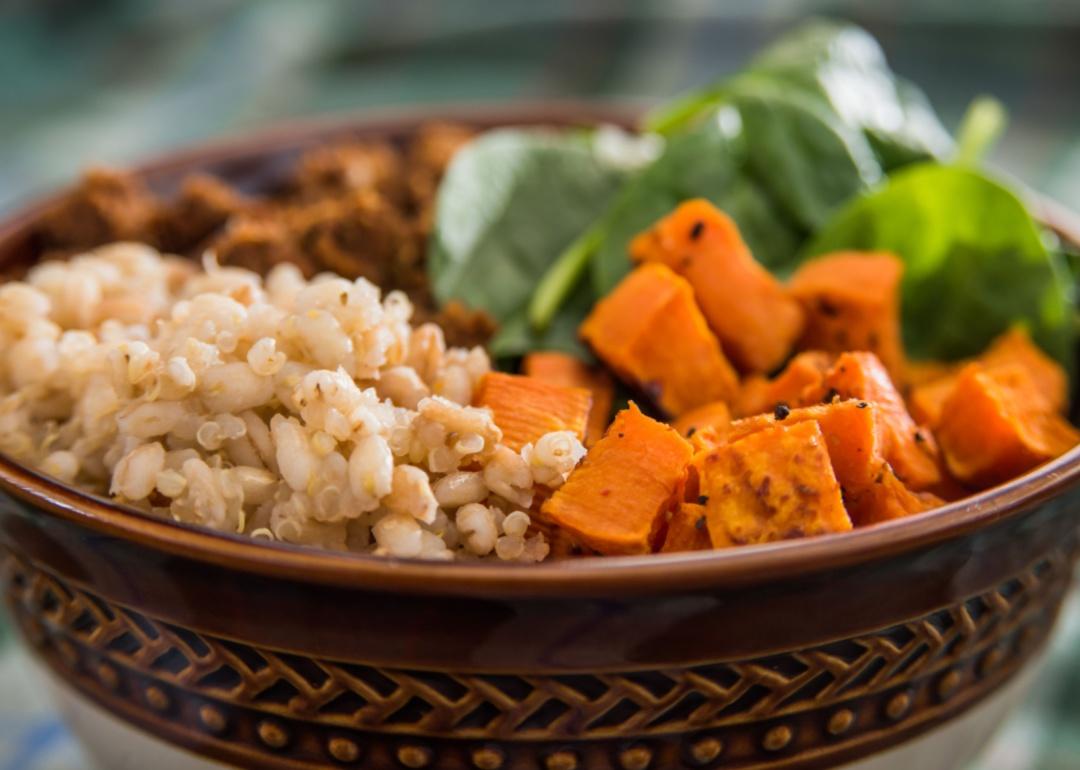 A brown rice, quinoa, spinach and sweet potato bowl.