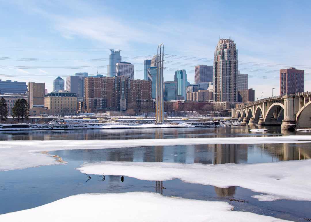 Icy waters with Minneapolis in the background.