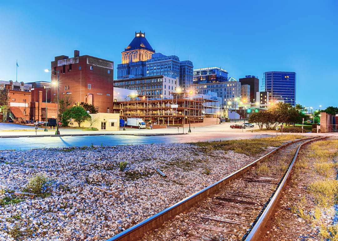 Railroad tracks with Greensboro in the background.