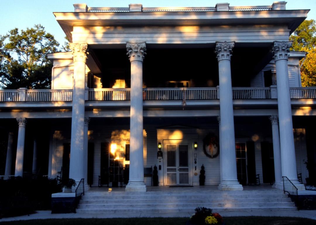 The exterior of a historic inn with great columns in Union.