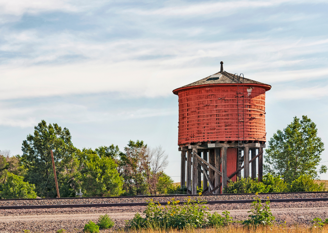 A historic red water tower in Lusk.