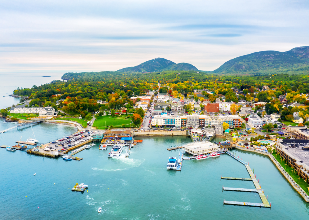 Aerial view of colorful buildings and beautiful water in Bar Harbor, Maine.