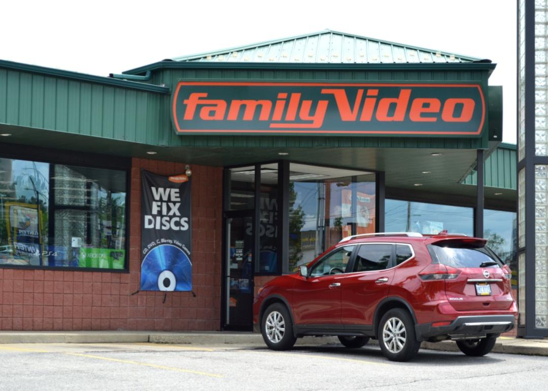 A Family Video location with a green roof and orange sign.