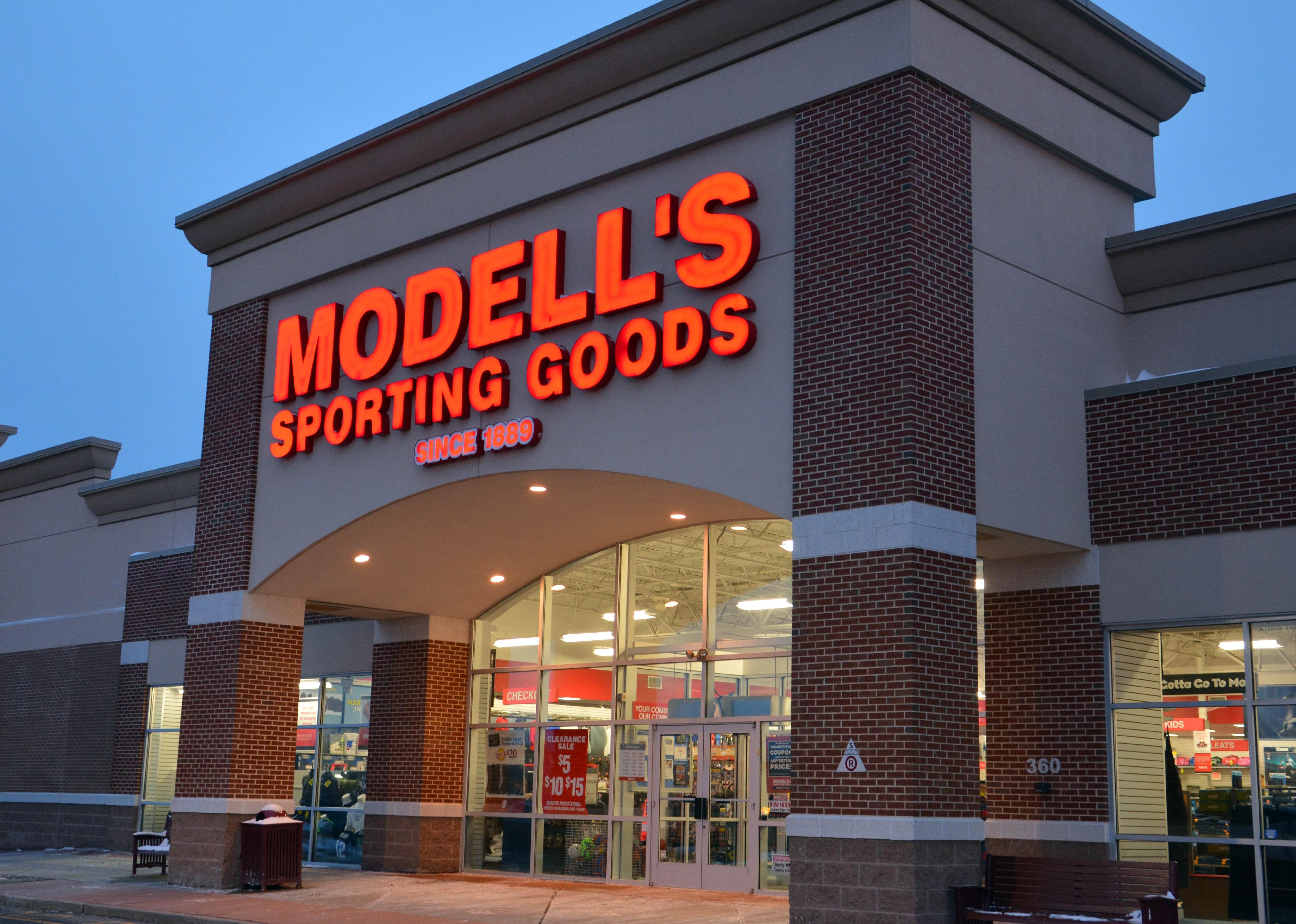 The brick exterior of a Modell's Sporting Goods store.