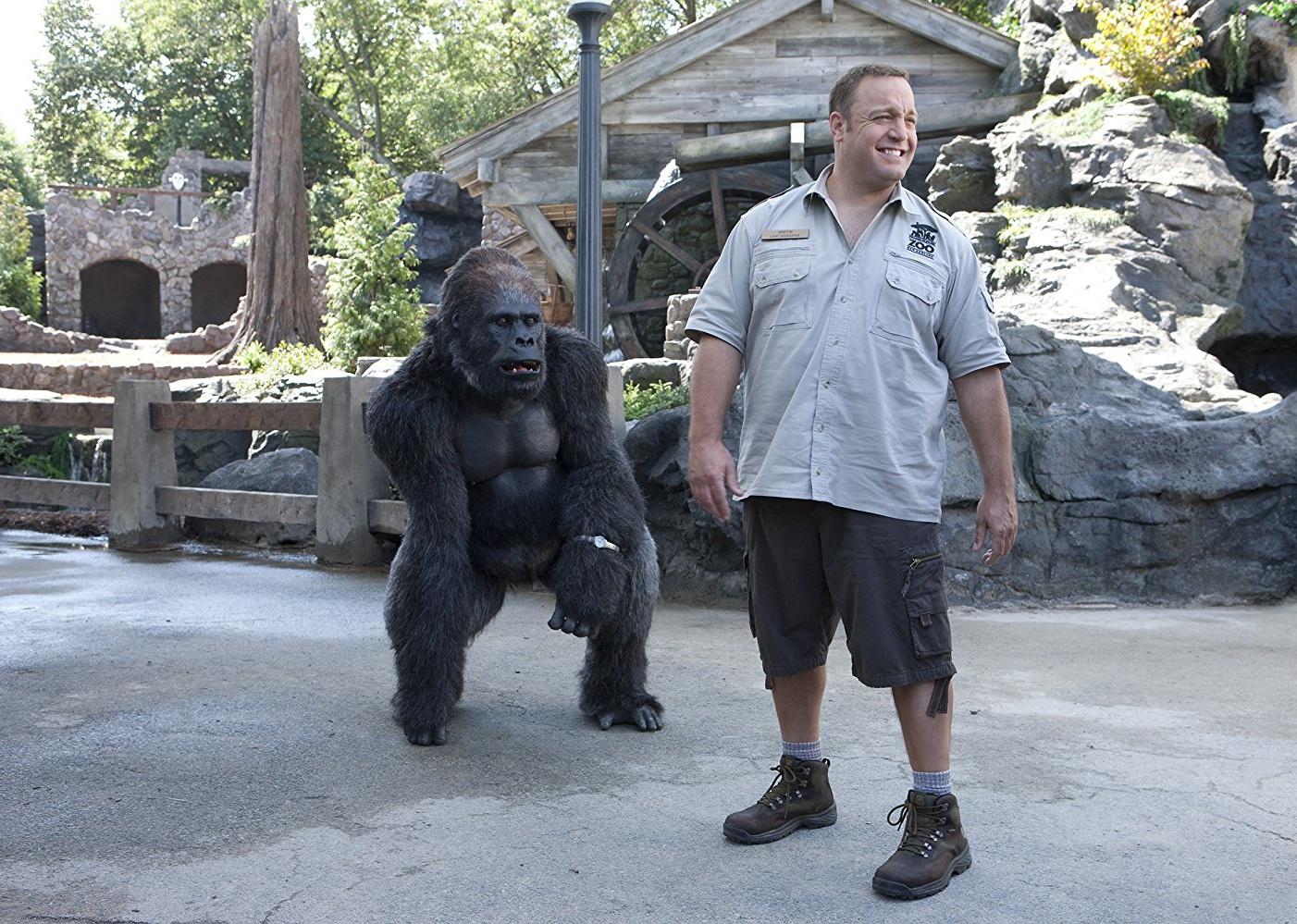 Kevin James standing next to a gorilla.