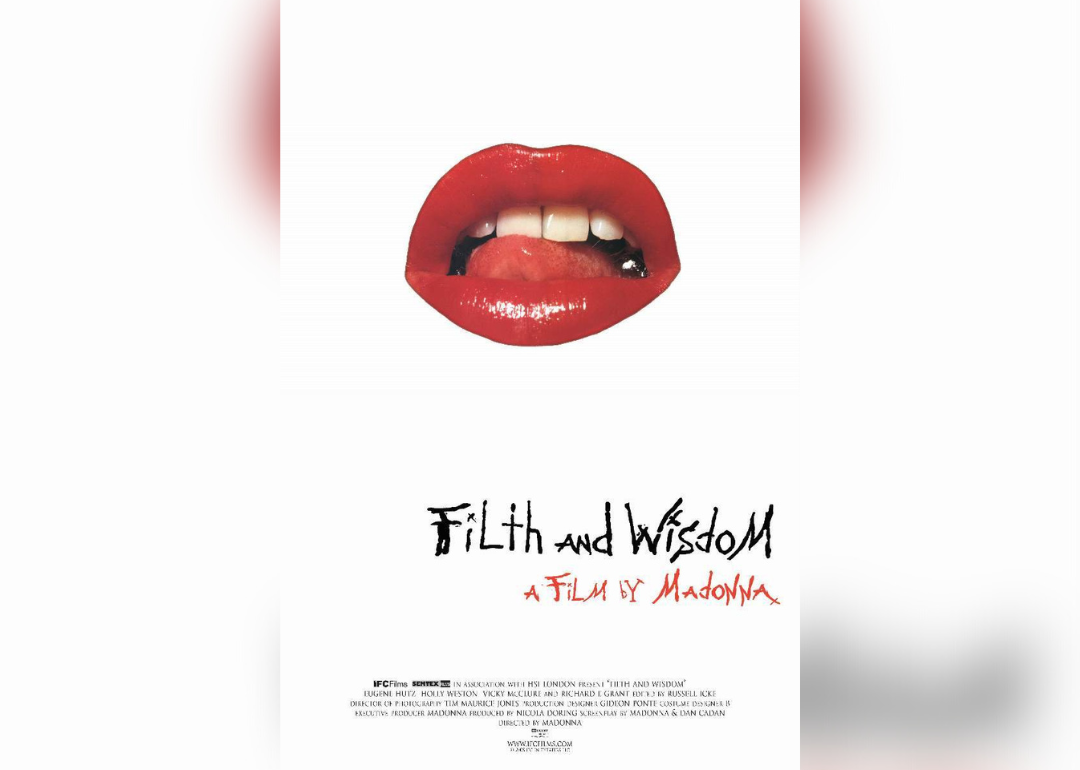 A tongue licking red lips on a movie cover.