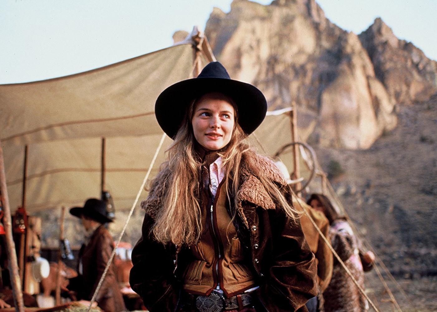 Heather Graham dressed as a cowgirl.