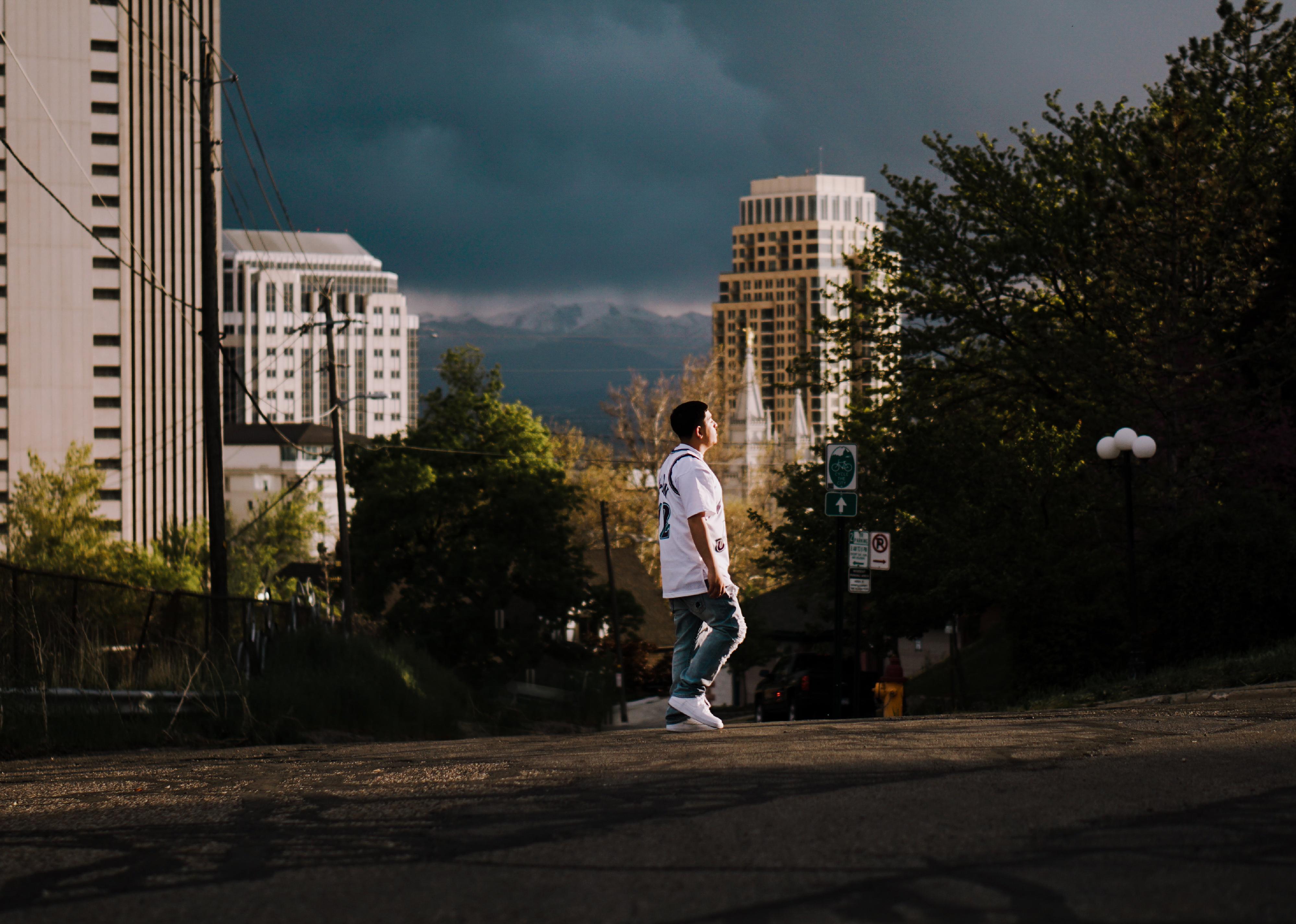 A man walks across the street in Utah.