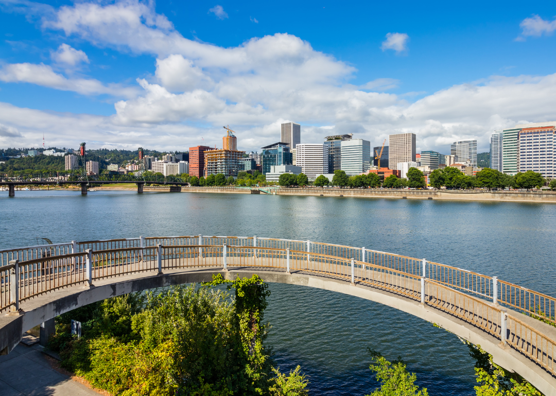 Downtown Portland from a footbridge across the water.