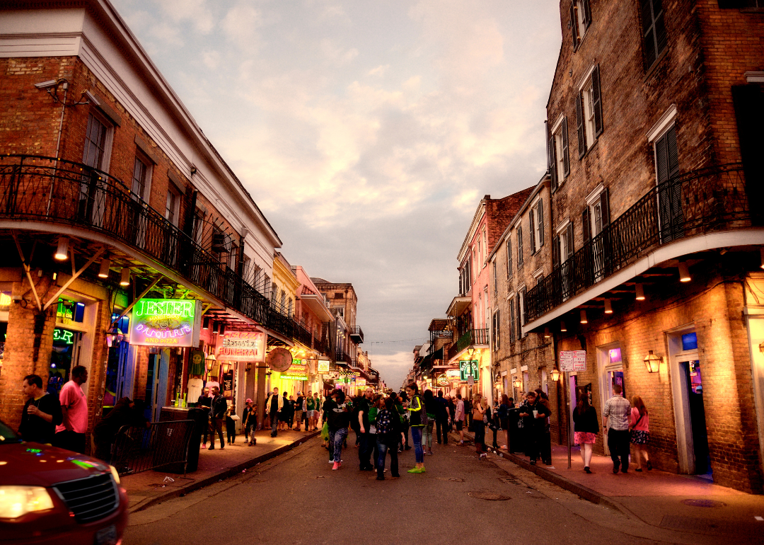 A busy downtown New Orleans in the evening.
