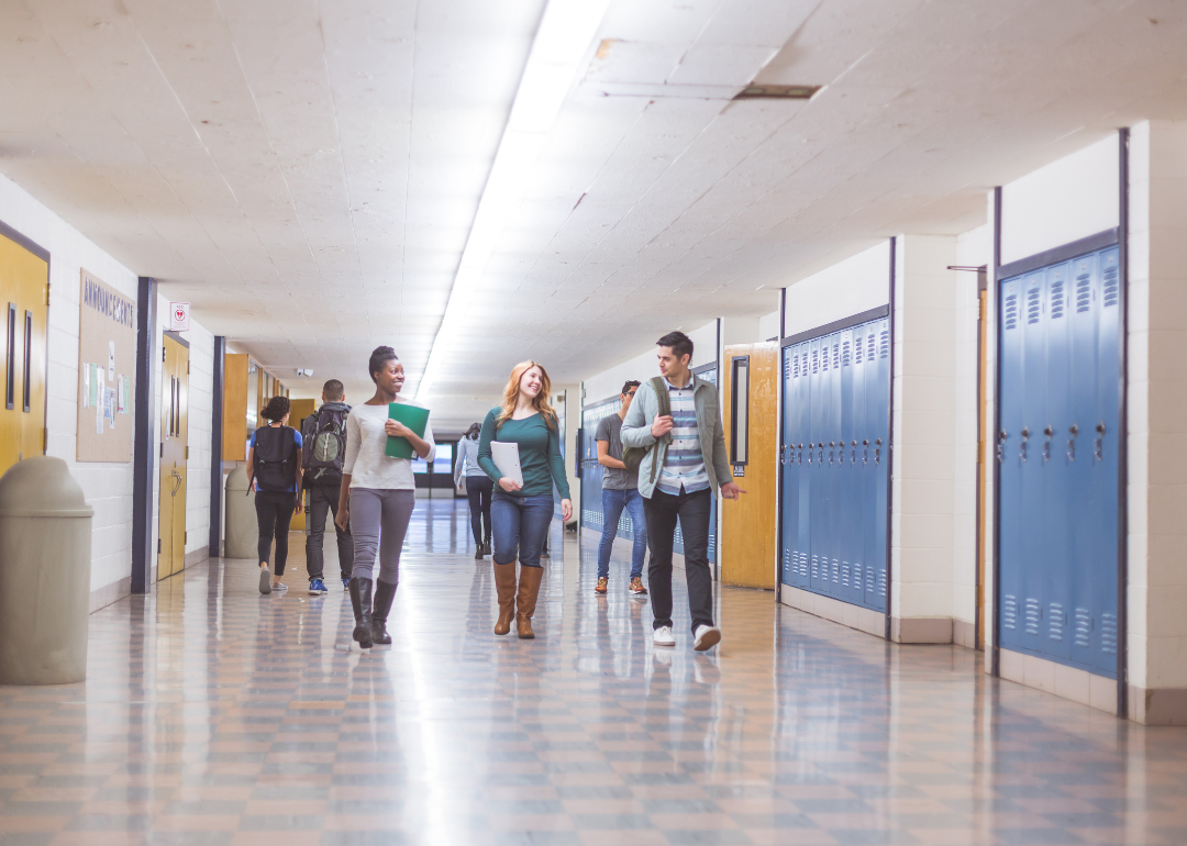 High school students walking down the hallway.