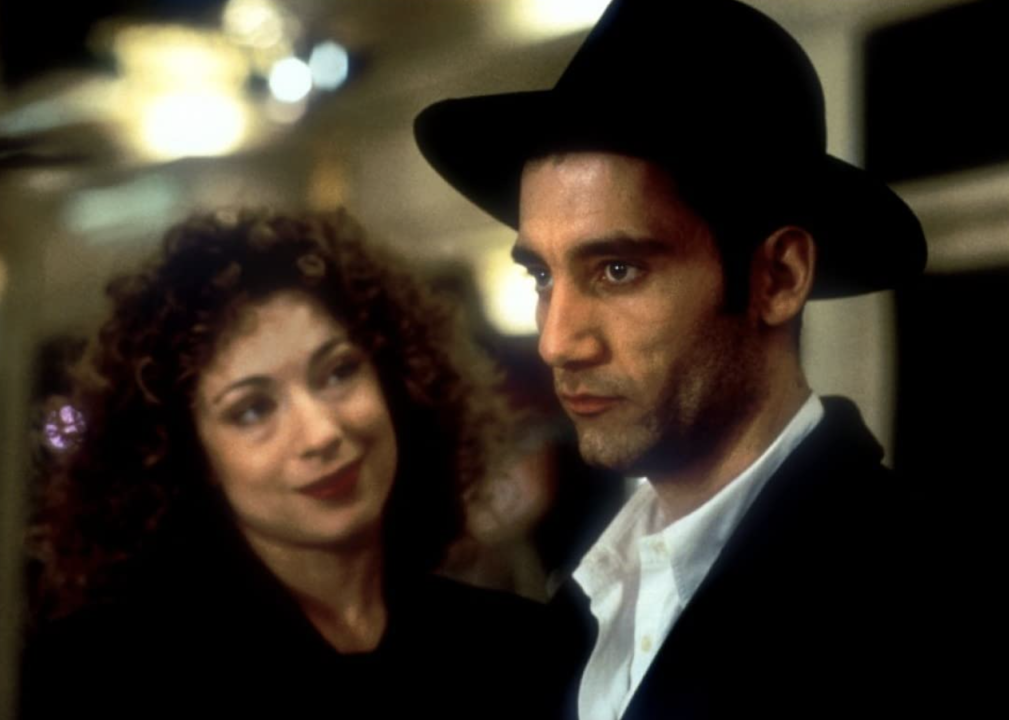 Alex Kingston and Clive Owen in a scene from "Croupier"