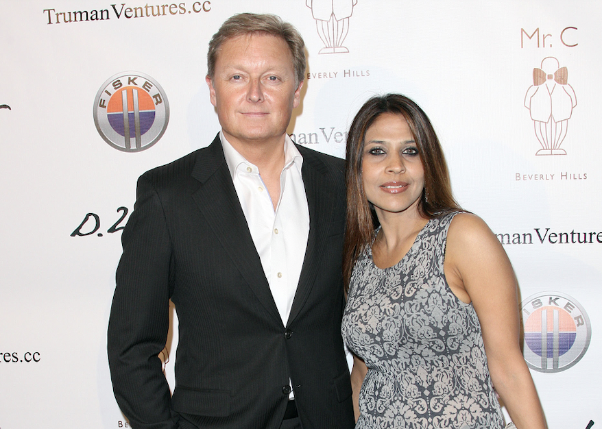 Henrik Fisker and Geeta Gupta attend an art show 
