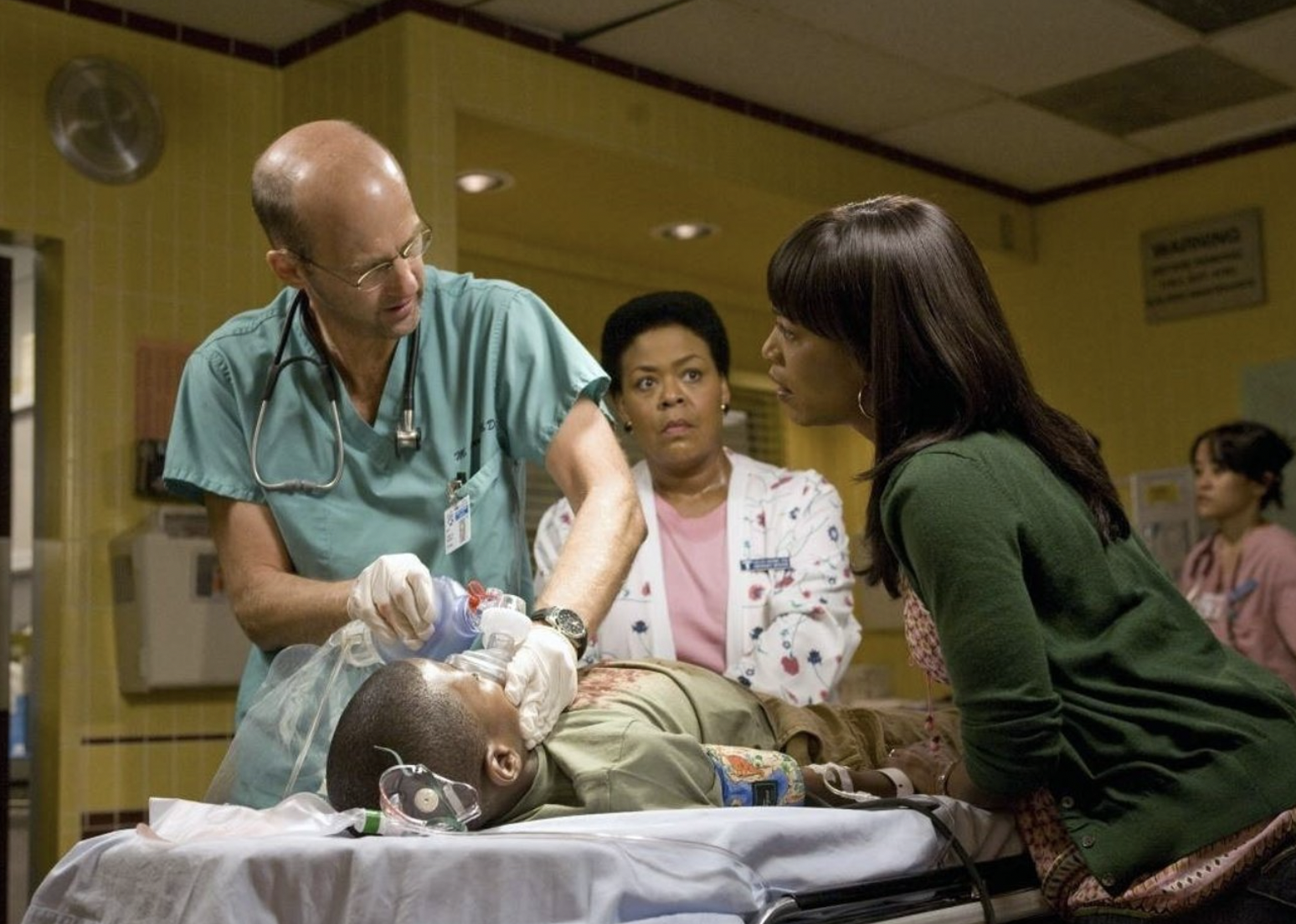 Angela Bassett, Anthony Edwards, and Yvette Freeman in "ER"