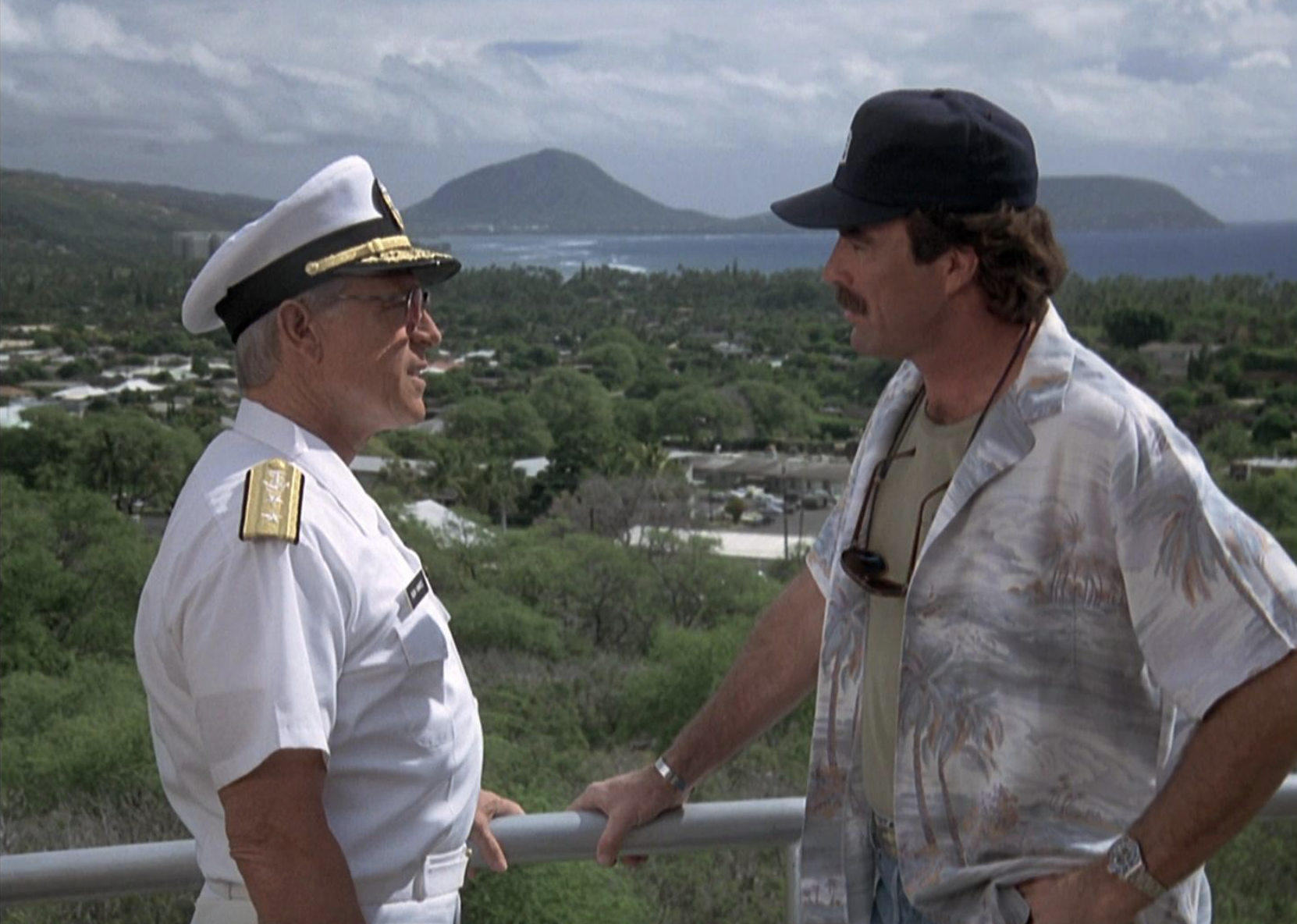 Tom Selleck and Paul Burke in "Magnum, P.I."