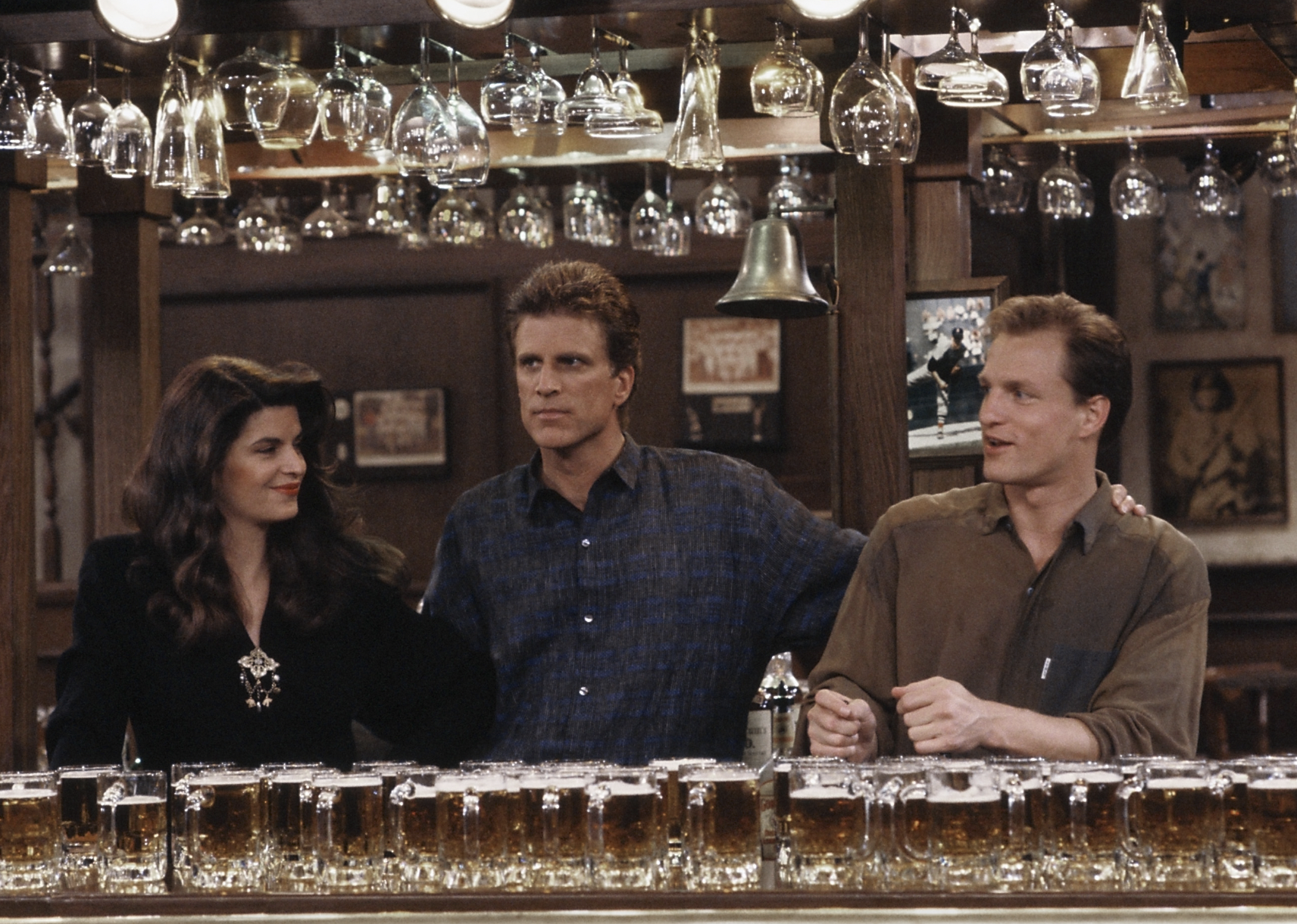 Kirstie Alley, Woody Harrelson, and Ted Danson in "Cheers"