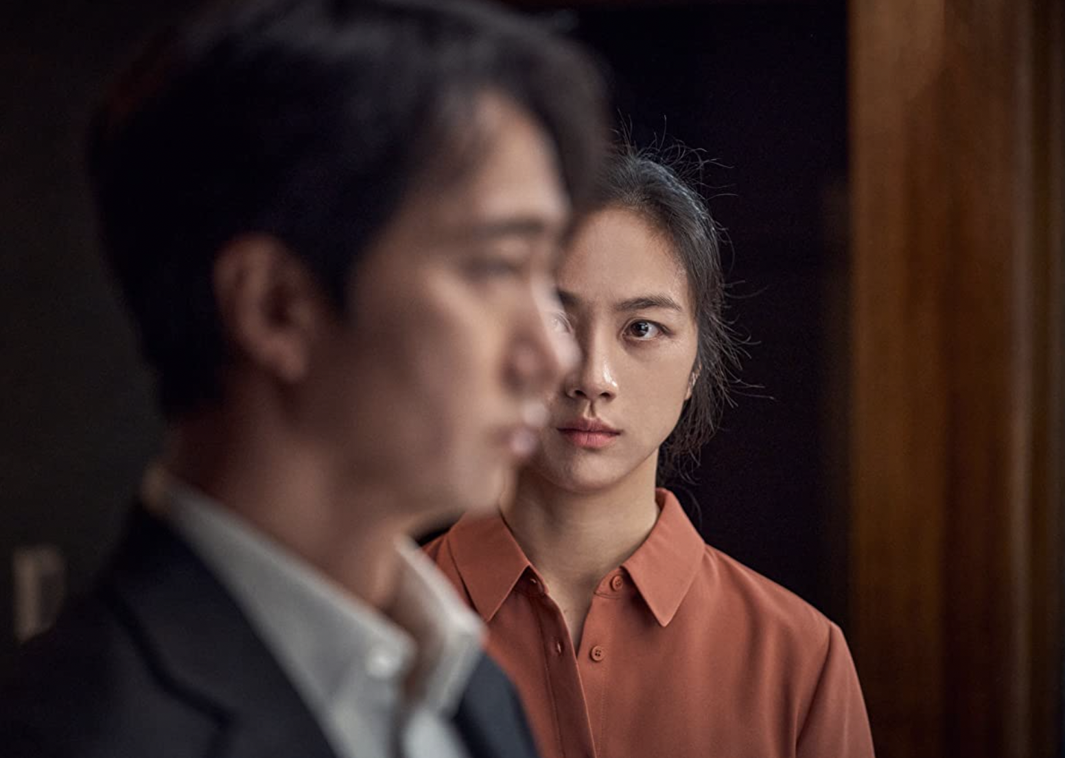 Park Hae-il and Tang Wei in "Decision to Leave".