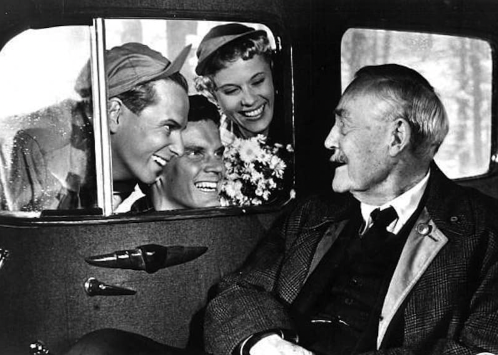 Bibi Andersson, Björn Bjelfvenstam, Victor Sjöström, and Folke Sundquist in "Wild Strawberries".