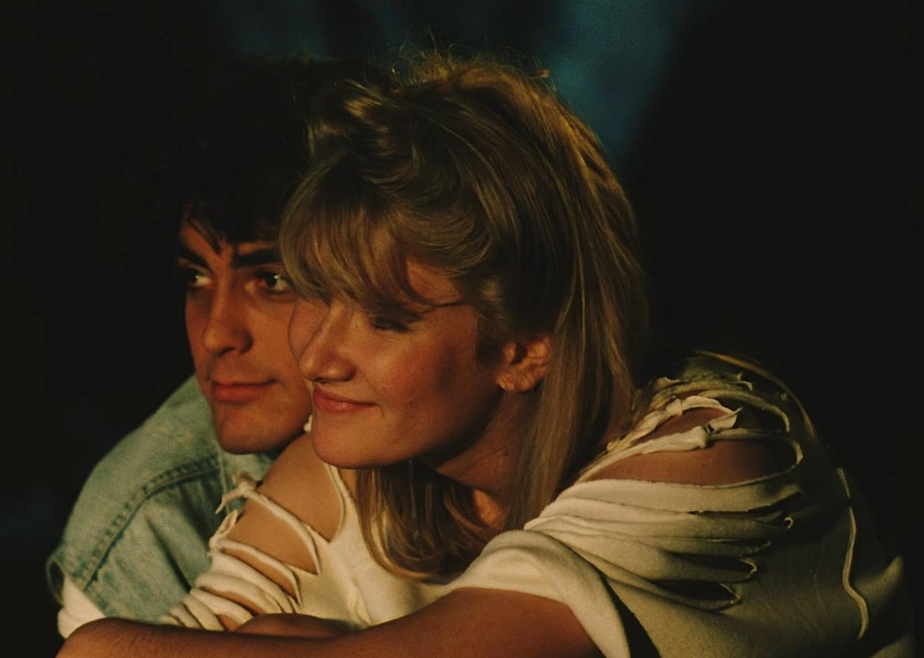 George Clooney and Laura Dern in "Grizzly II: Revenge "