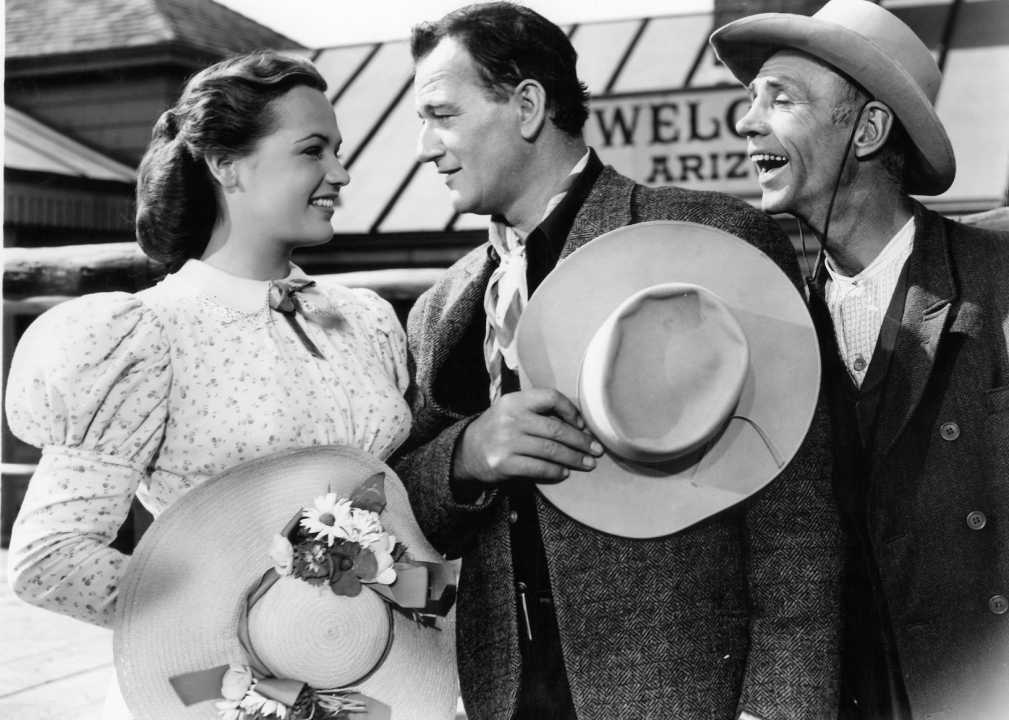 Dorothy Ford and John Wayne looking into each other