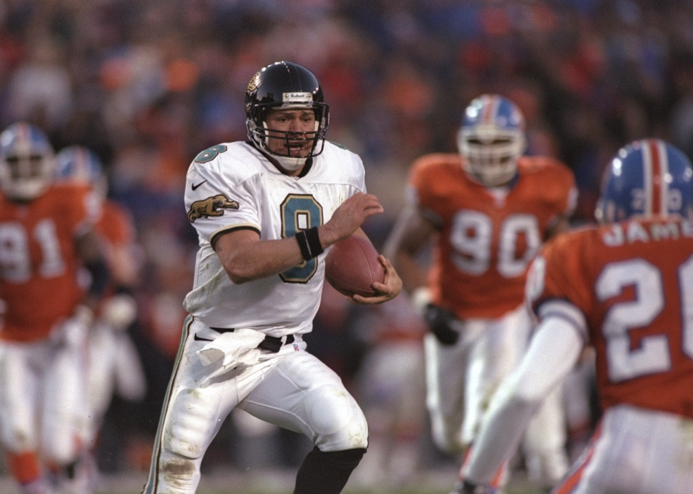Quarterback Mark Brunell of the Jacksonville Jaguars moves the ball during the playoff game.