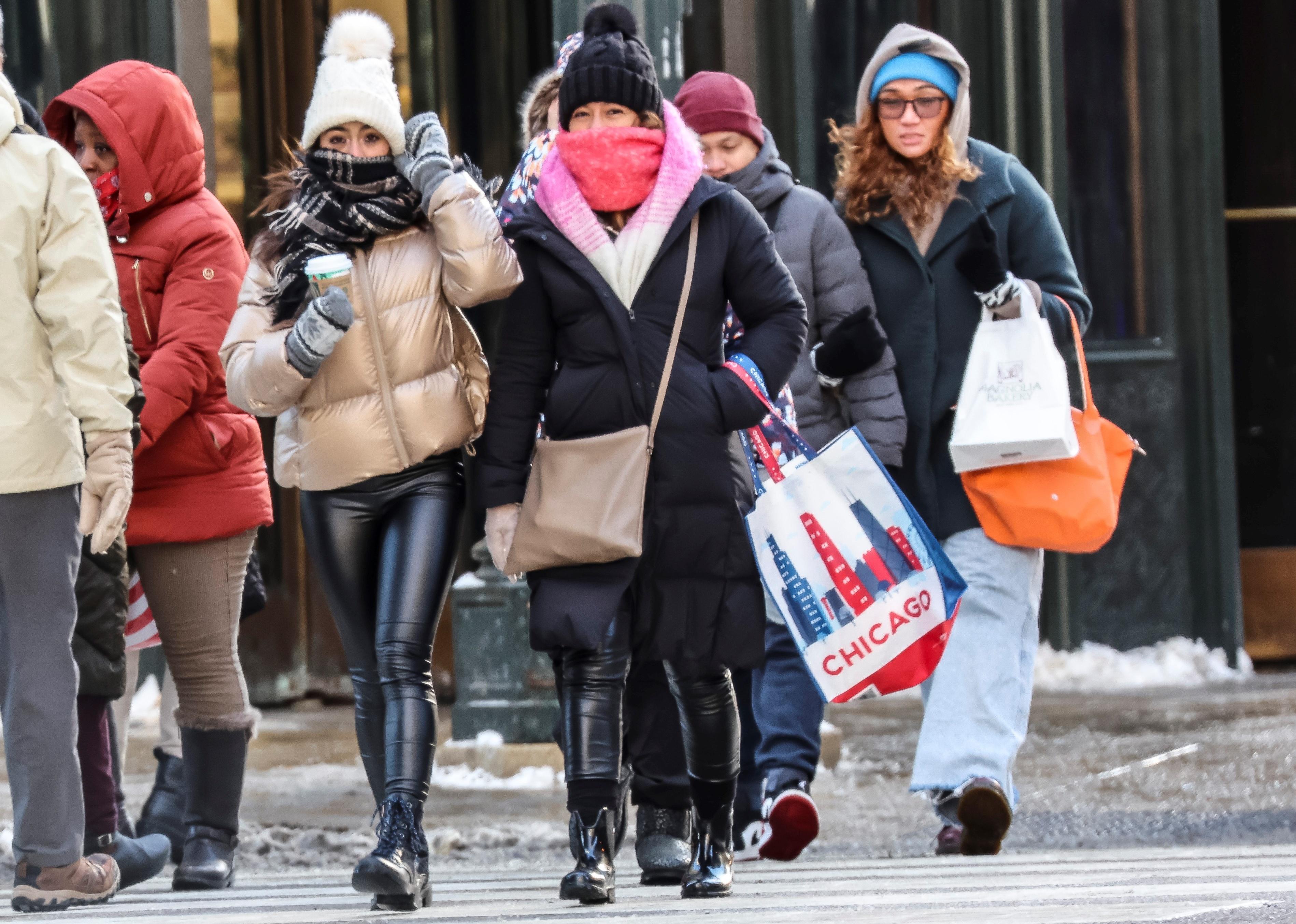 Bundled up shoppers walking downtown in Chicago.