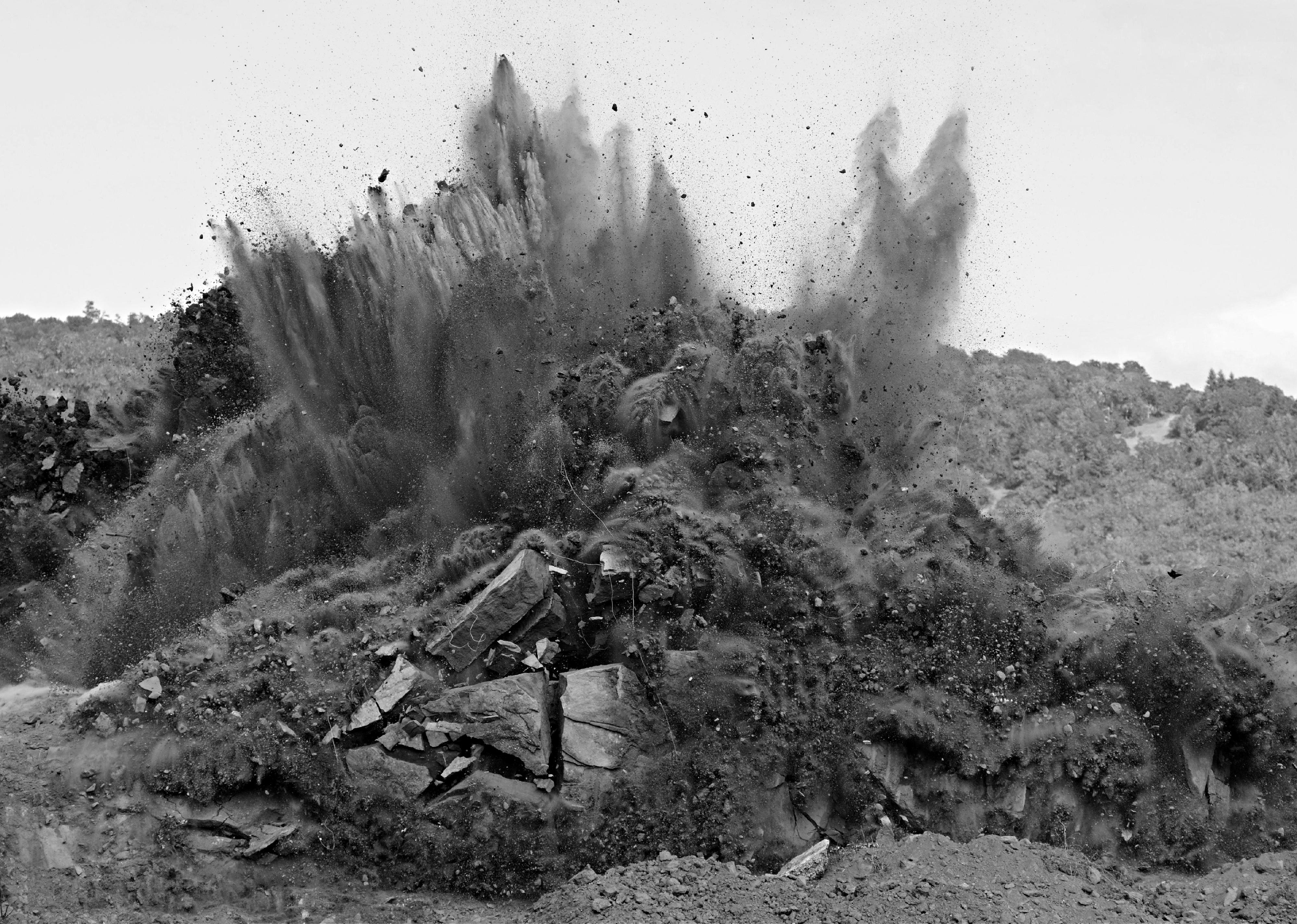 A black and white photo of an explosion.