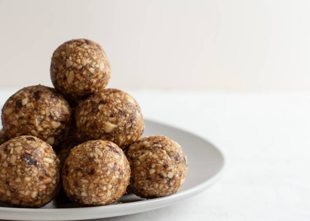 A plate stacked with oat balls.