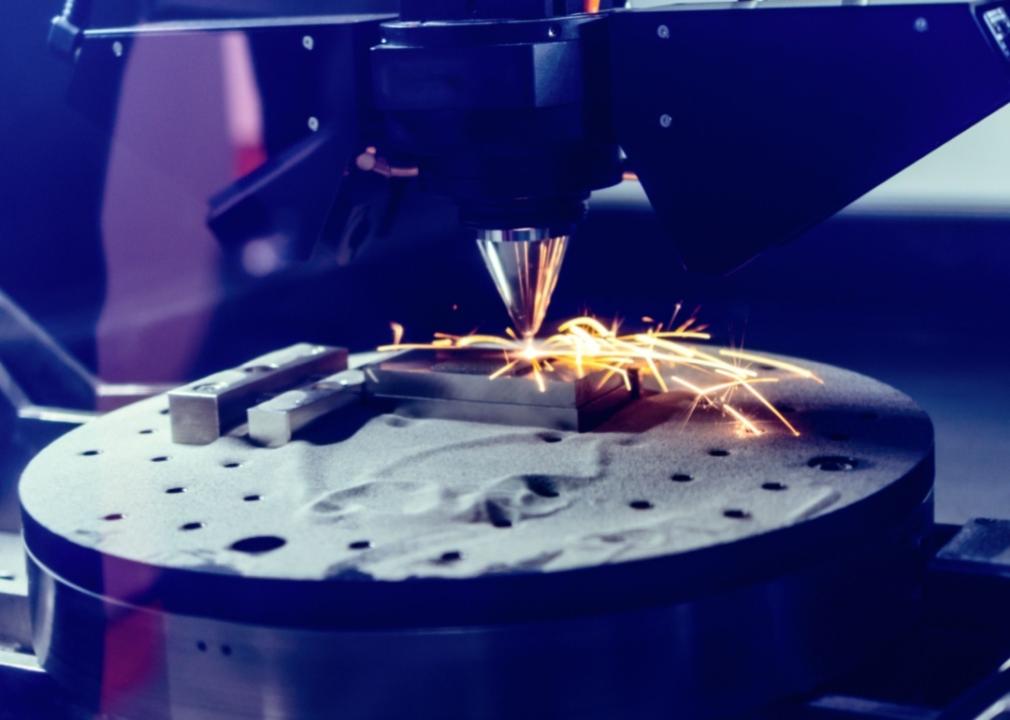 A 3D metal printer sintering parts.