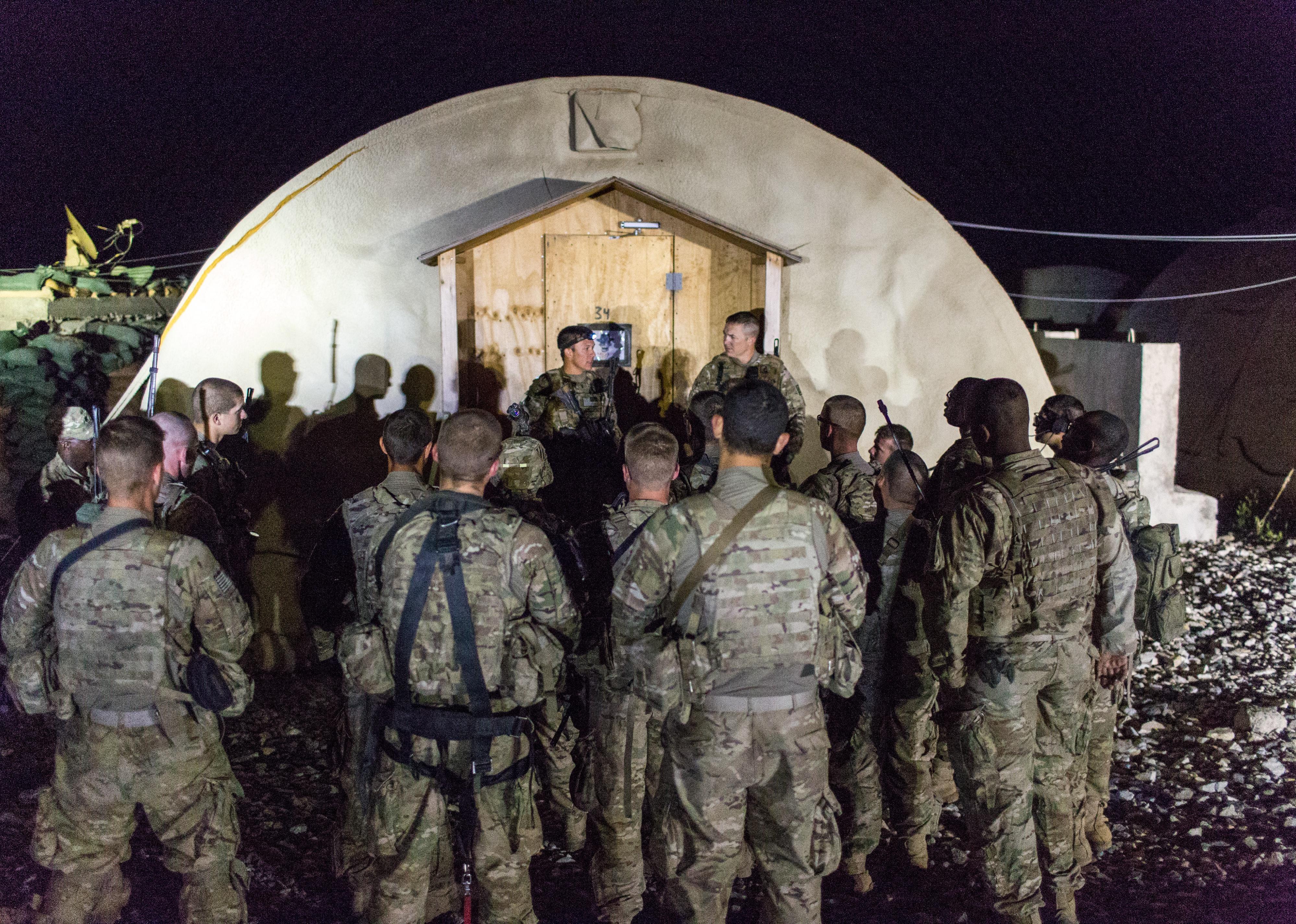 US Army soldiers receive a briefing in Afghanistan.