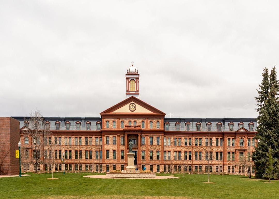 A long rectangular historic brick building.