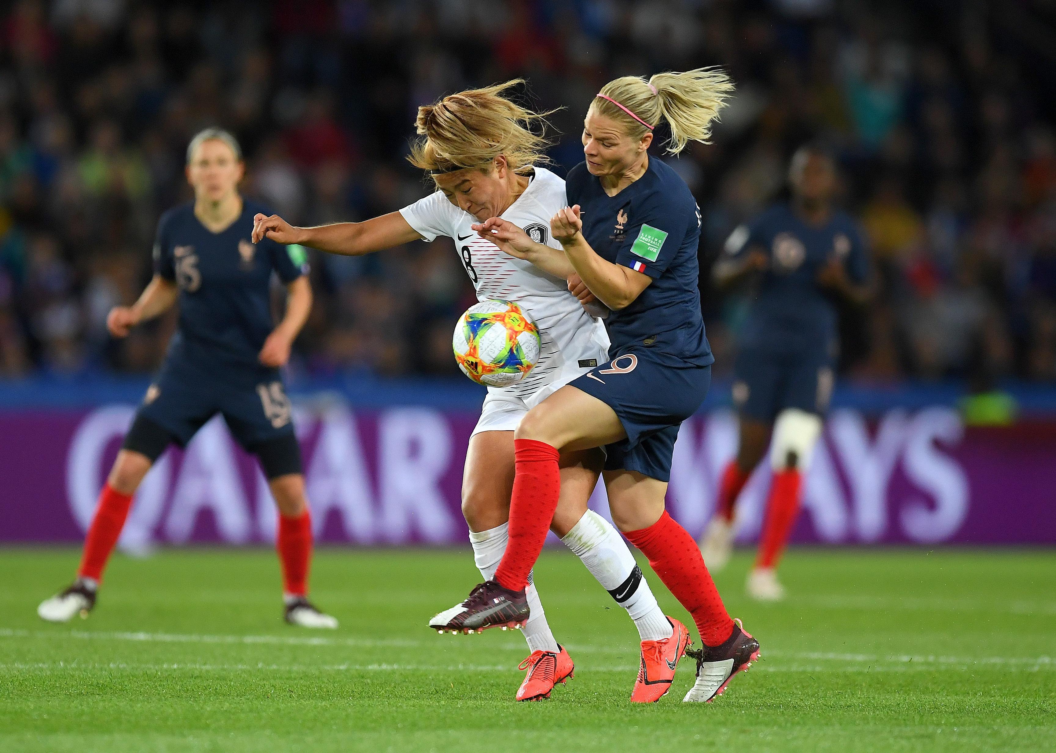 Eugenie Le Sommer of France battling for possession with Sohyun Cho of Korea Republic during the 2019 FIFA Women's World Cup France.