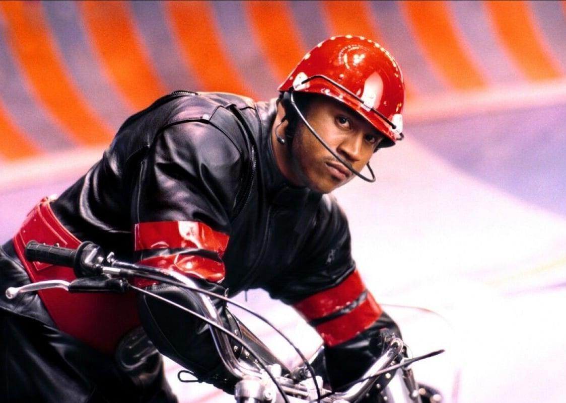 LL Cool J in a red helmet playing rollerball
