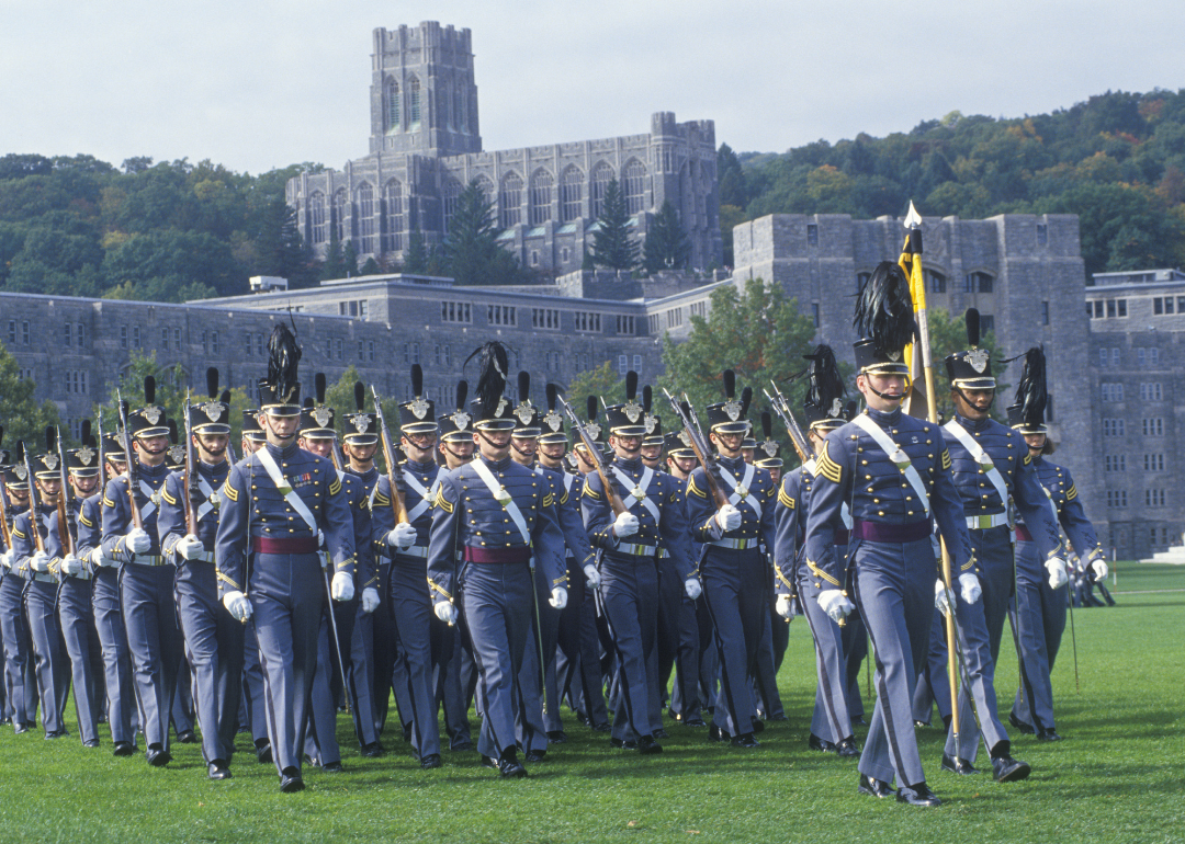 Cadets in uniform marching at West Point.