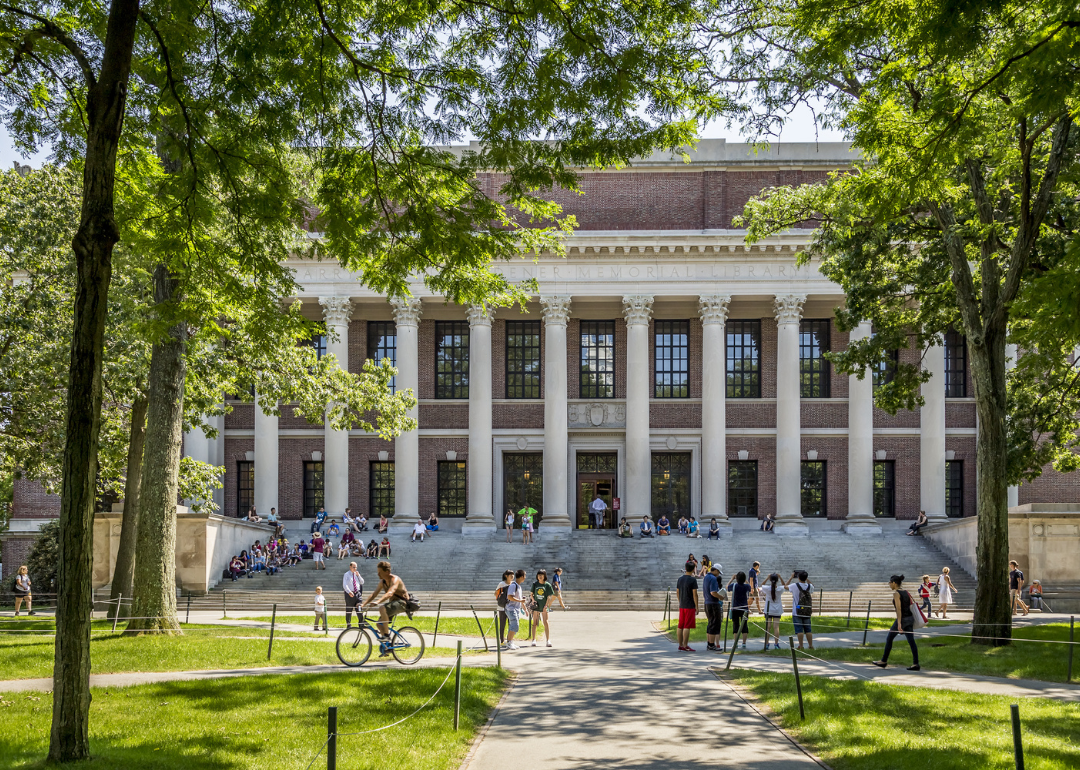 Students outside Harvard University Campus Library.