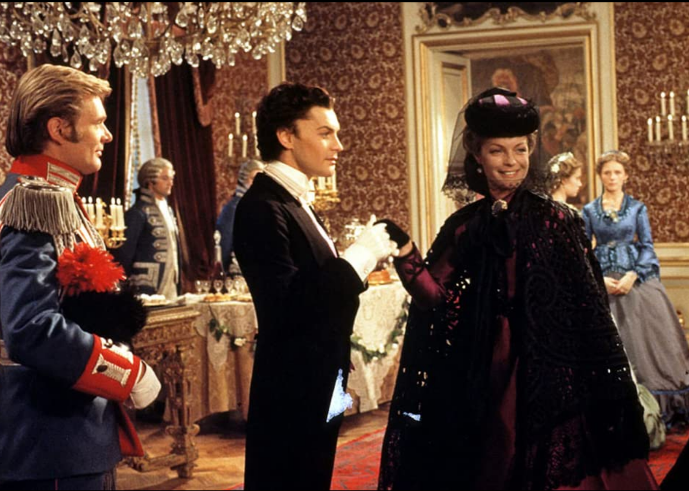 Helmut Berger, Romy Schneider, and Helmut Griem in a scene from "Ludwig".