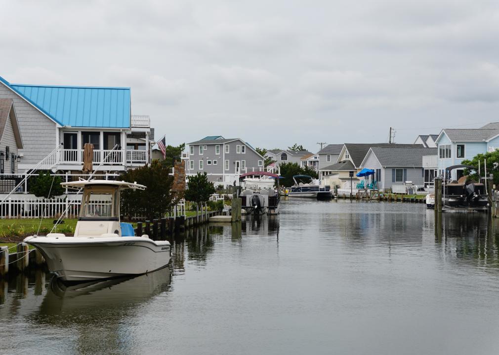 View of waterfront homes with boat docks.