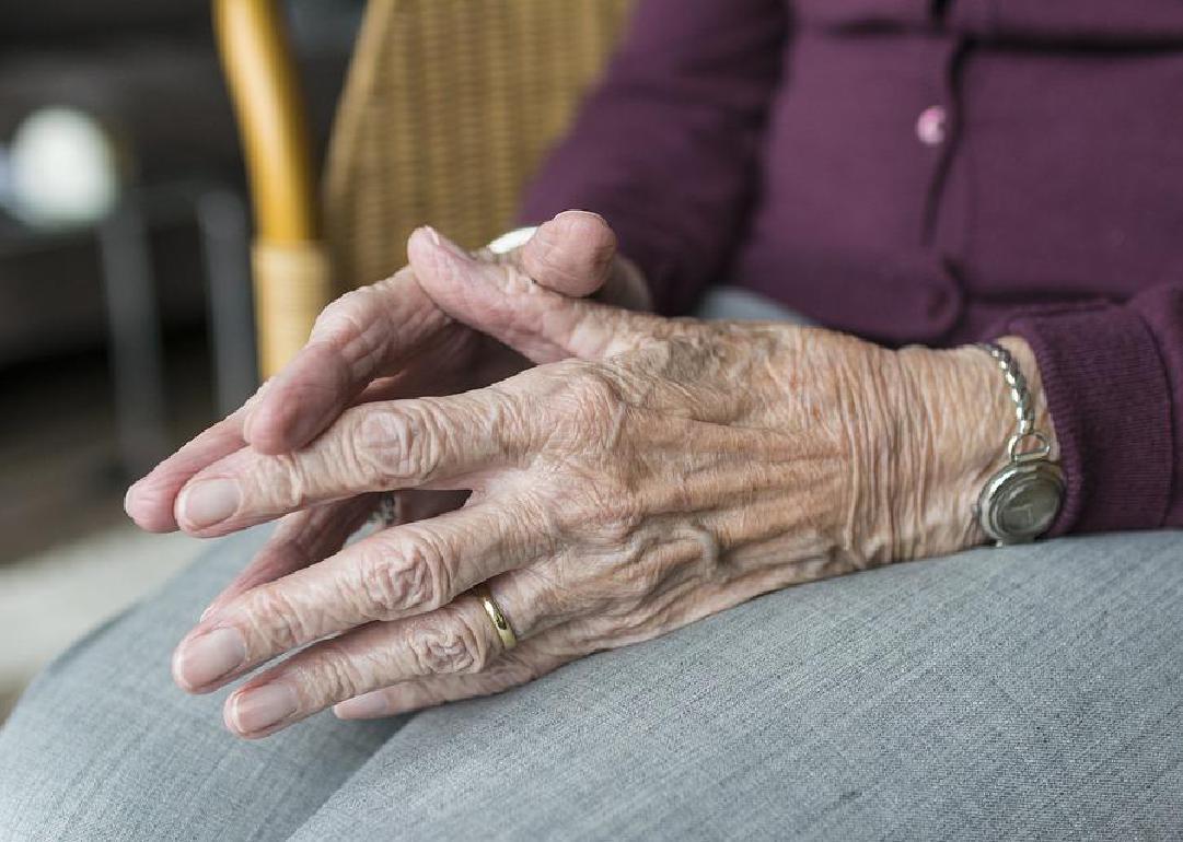 A close up of an elderly person's hands. 