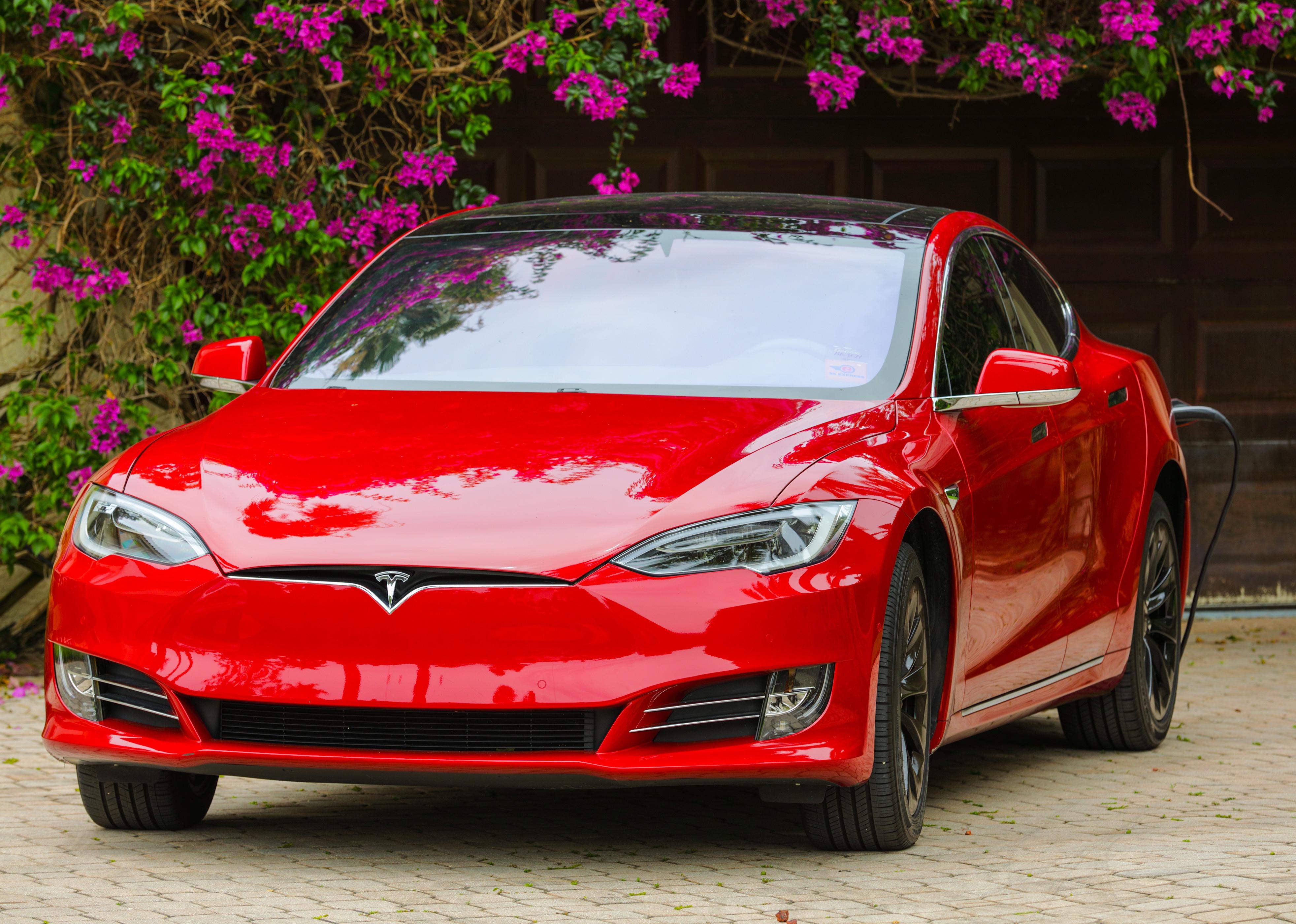 A Tesla Model S charging at home.