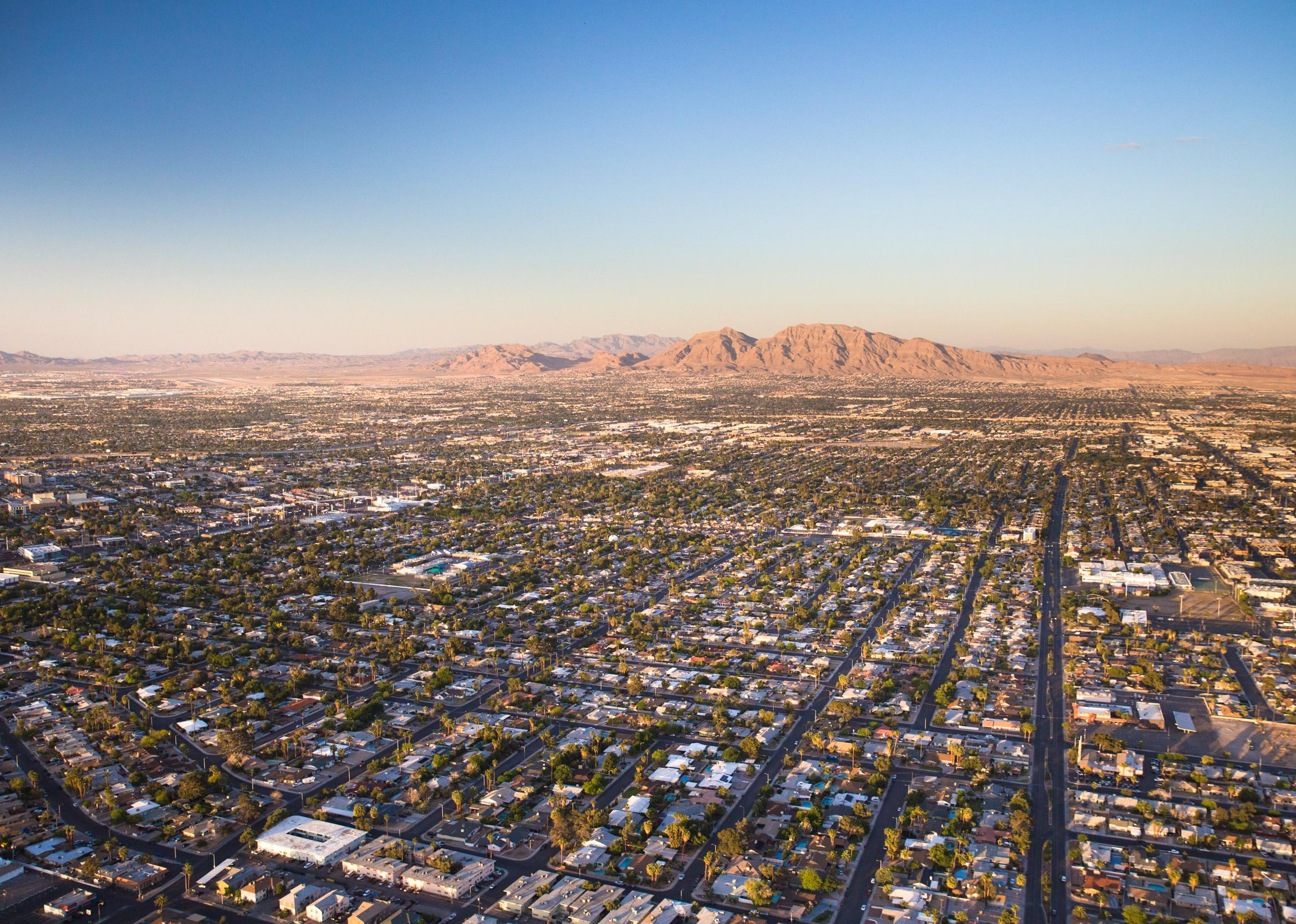 Aerial view across urban suburban communities seen from Las Vegas.