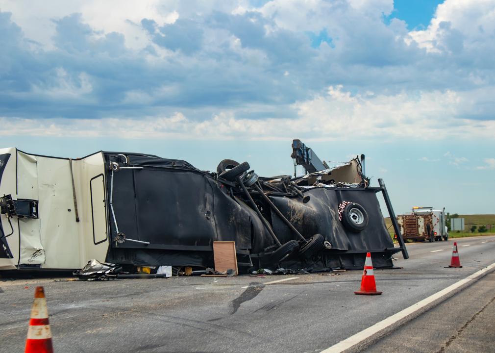 Fifth wheel overturned on a highway with the underside torn up